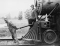 Engineers pulling train engine