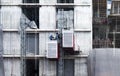 Engineers repairing elevators at construction site Royalty Free Stock Photo