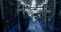 Engineers testing on robot controls inside the laboratory
