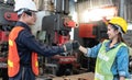 2 engineers Used hand for fist bump to show their cooperation For success teamwork