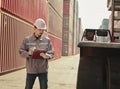 Engineers walking and checking condition Forklift container