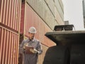 Engineers walking and checking condition Forklift container