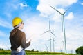Engineers woman windmills for production of electric power on ba