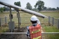 Engineers are working on inspecting solar power generation equipment. Royalty Free Stock Photo