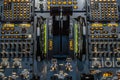 Engines thrust levers inside a big jet plane