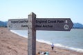 An England Coastal Path sign near Blue Anchor in Somerset. It points to Dunster to the west and Blue Anchor to the east Royalty Free Stock Photo