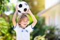 England football fan kids. Children play soccer Royalty Free Stock Photo