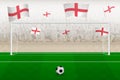 England football team fans with flags of England cheering on stadium, penalty kick concept in a soccer match Royalty Free Stock Photo