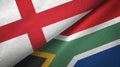 England and South Africa two flags textile cloth, fabric texture