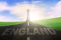 England word on road with arrow upward Royalty Free Stock Photo