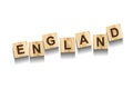 England, word on wooden blocks. Isolated on a white background Royalty Free Stock Photo