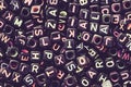 English alphabet black cube as background