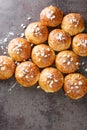 English bath buns roll with cumin and sugar close-up. Vertical top view Royalty Free Stock Photo