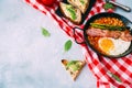 English breakfast concept with avocado toast over blue vintage background. Royalty Free Stock Photo