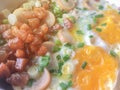 English breakfast consist of fried egg, beans, bacon and garnish with fragrant Royalty Free Stock Photo