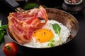 English breakfast - fried egg, beans, tomatoes, mushrooms, bacon Royalty Free Stock Photo