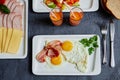 English Breakfast with scrambled eggs and bacon, carrot juice, b Royalty Free Stock Photo