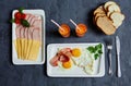 English Breakfast with scrambled eggs and bacon, carrot juice, b Royalty Free Stock Photo