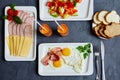 English Breakfast with scrambled eggs and bacon, carrot juice, b Royalty Free Stock Photo