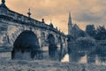 The English Bridge spanning the River Severn in Shrewsbury, Shropshire, England.  With the United Reformed Church Royalty Free Stock Photo