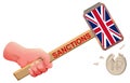 English British sanctions against russian financial system. Hand hammer british flag beat coin