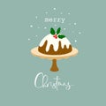 English Christmas pudding on cake stand glazed and decorated by holly. Traditional holiday dessert. Lettering Merry Christmas Royalty Free Stock Photo