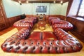 English cigar room with leather armchairs for rest