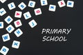 English colored square letters scattered on black background with text primary school