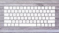 English computer keyboard layout on wooden background