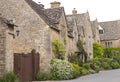 English Cotswolds houses with flowering summer gardens Royalty Free Stock Photo