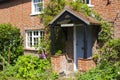 An English Cottage Garden in Warsash in Hampshire showing a riot of chaotic colour in early summer Royalty Free Stock Photo