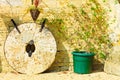 English cottage and old stone wheels Royalty Free Stock Photo