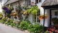 English country cottage decked with flowers