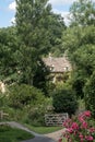 English Country cottage in idyllic setting Cotswolds Royalty Free Stock Photo