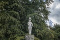 English countryside - Rudyard Lake, a sculpture of a tightrope walker. Royalty Free Stock Photo