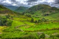 English countryside scene the Lake District with valley and mountains and green fields in HDR Royalty Free Stock Photo