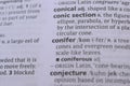English Dictionary Book Page Close Up With The Word Definition Of - conic section Royalty Free Stock Photo
