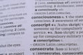 English Dictionary Book Page Close Up With The Word Definition Of - conscript Royalty Free Stock Photo