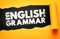 English grammar educational concept with bold typography on torn paper background, symbolizing language learning, writing rules, Royalty Free Stock Photo