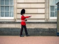 English guard patrolling at Buckingham Palace Royalty Free Stock Photo