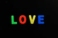 English letters in black background are the words love