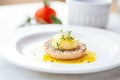 english muffin with melting butter on white plate Royalty Free Stock Photo