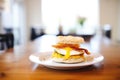 english muffin sandwich with bacon and egg Royalty Free Stock Photo