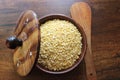 Yellow Moong dal in wooden bowl