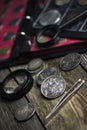 English old coin, magnifier and tweezers, numismatics Royalty Free Stock Photo