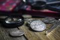 English old coin, magnifier and tweezers, numismatics Royalty Free Stock Photo