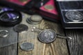 English old coin, magnifier and tweezers, numismatics Royalty Free Stock Photo