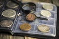 English old coin, magnifier and tweezers, numismatics Royalty Free Stock Photo