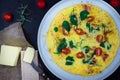 English Omelette with Butter and Tomatoes on Dark Background, Horizontal