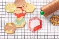 English paper pieced hexagons on white craft mat Royalty Free Stock Photo